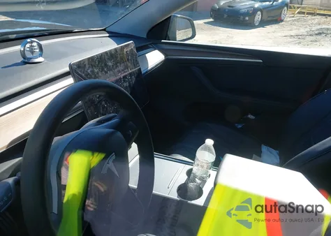 2023 Tesla Model Y Performance Dual Motor All-Wheel Drive z USA, uszkodzony, nr VIN 7SAYGDEFXPF942896